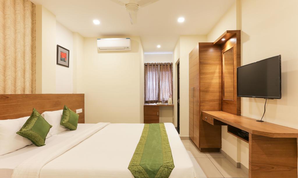 Treebo Trend Cmks Gulmohar Suites Kochi Exterior foto